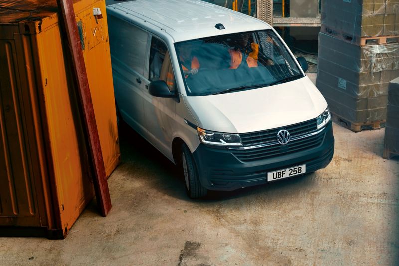 Top view of new VW Transporter 6.1 arriving at building site