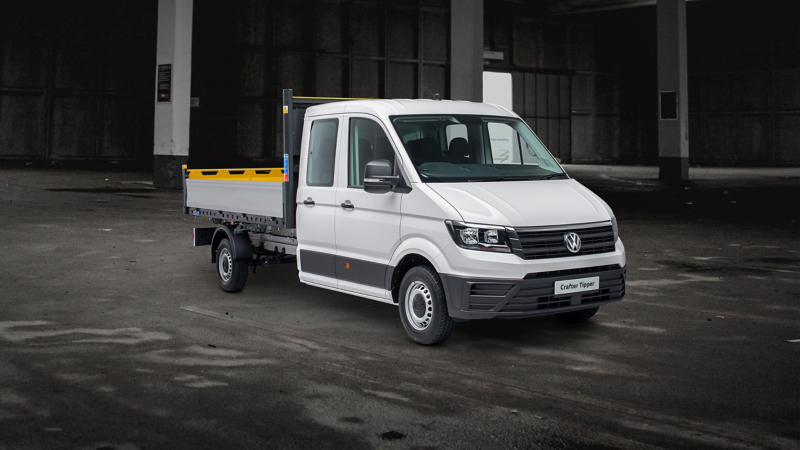 Front view of crafter tipper, parked in a warehouse.