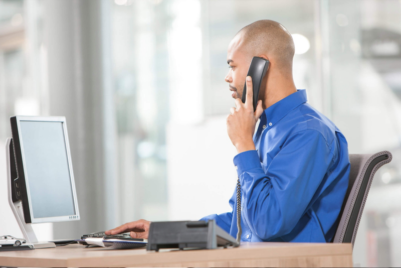 Customer care worker talking on phone