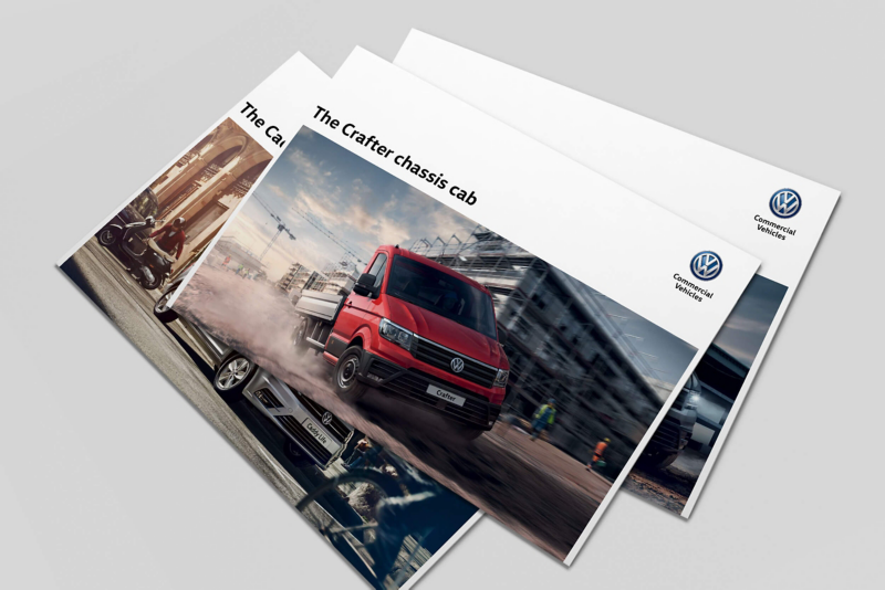 Stack of brochures with Crafter chassis cab on top