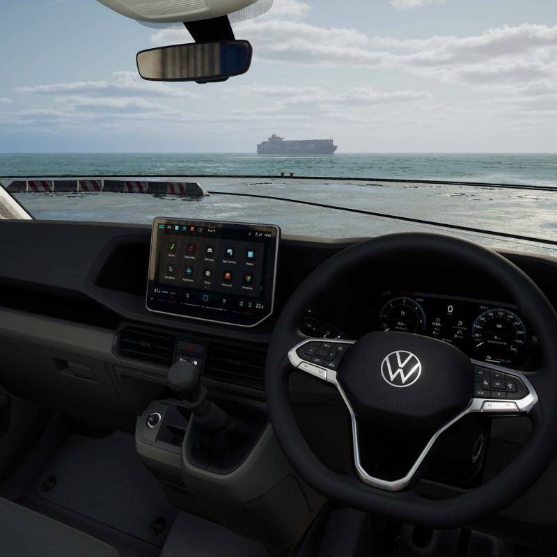 close up of the steering wheel and infotainment system in the Crafter panel van