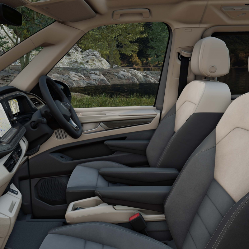 interior view of the VW Multivan focusing on the dashboard, front seats and steering wheel