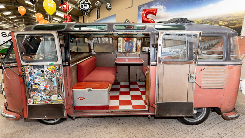 Photo showing the open side doors of the VW Samba van.