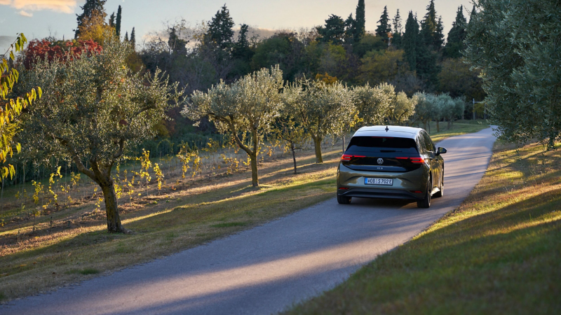 VW ID.3 drives along an idyllic country road