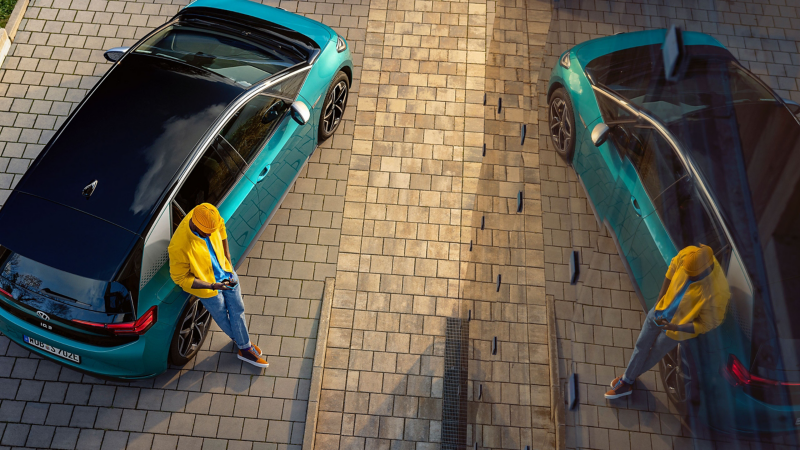 person leaning on a new volkswagen id.3