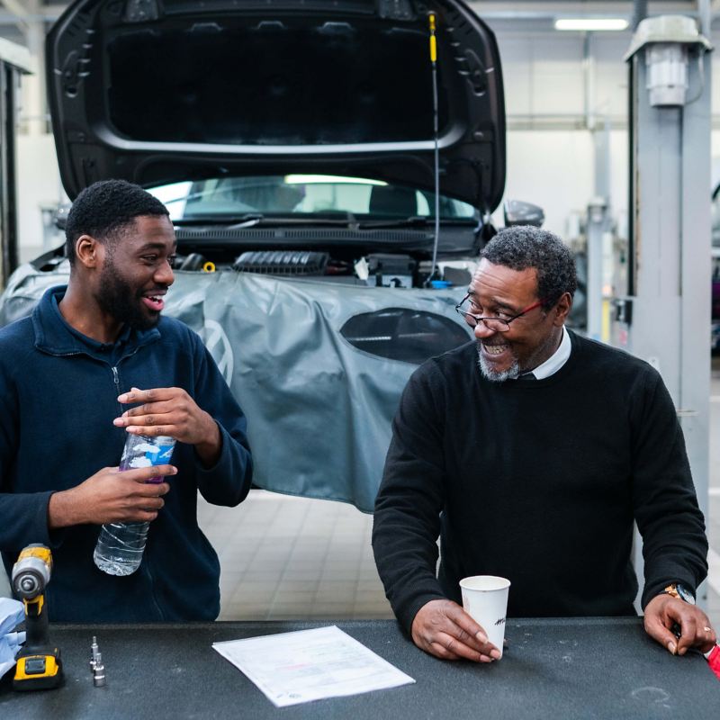 Two VW technicians at a service centre