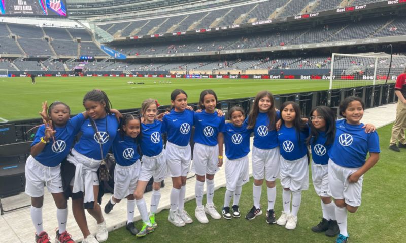 Underserved youth supported by Volkswagen at America Scores event.