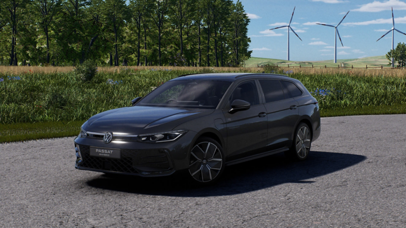 A black Passat Black Edition parked by a field with wind turbines
