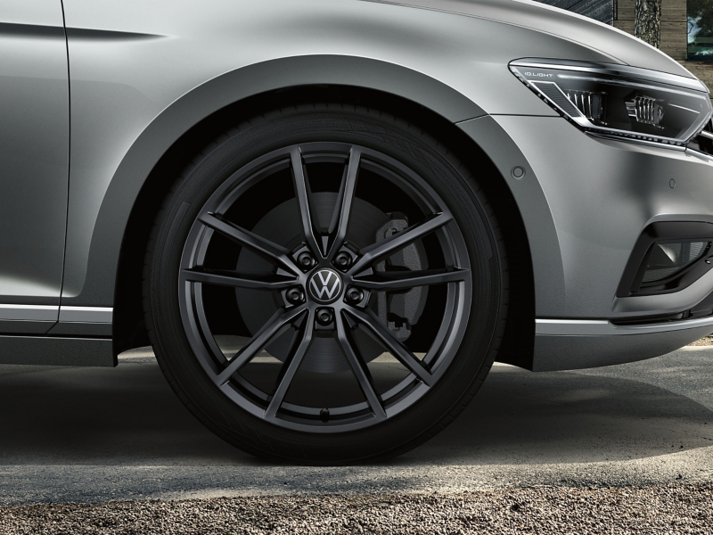 Grey Volkswagen car side view with alloy wheels 