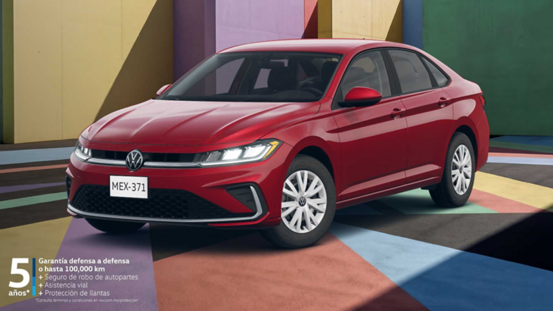 VW Jetta. Sedán de exterior rojo sobre un espacio multicolor. 