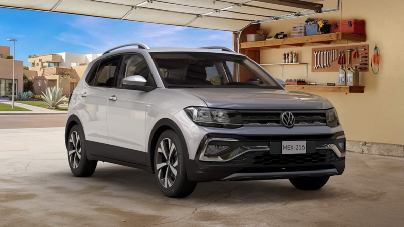 Volkswagen Taigun 2026 en color blanco estacionado dentro de un garage de residencia urbana.