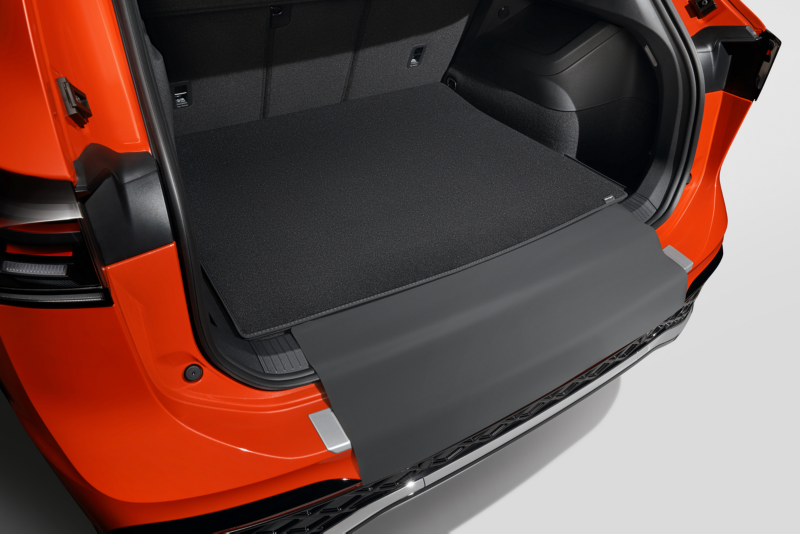 Reversible luggage compartment mat