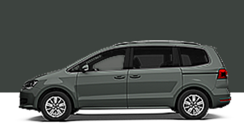 Side view of a VW Sharan on a green background