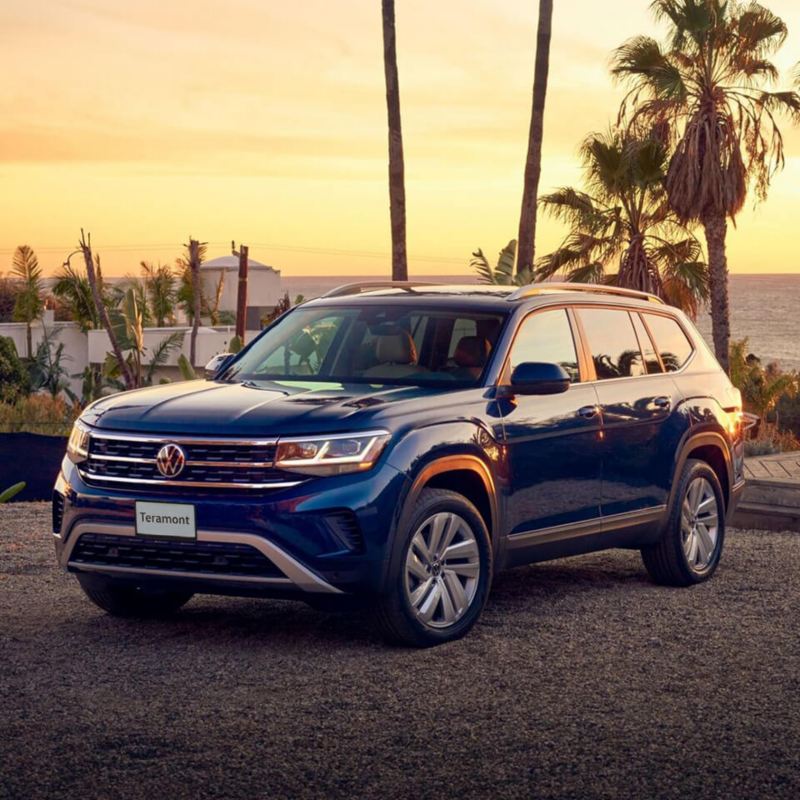 The Volkswagen Teramont driving around a mountain