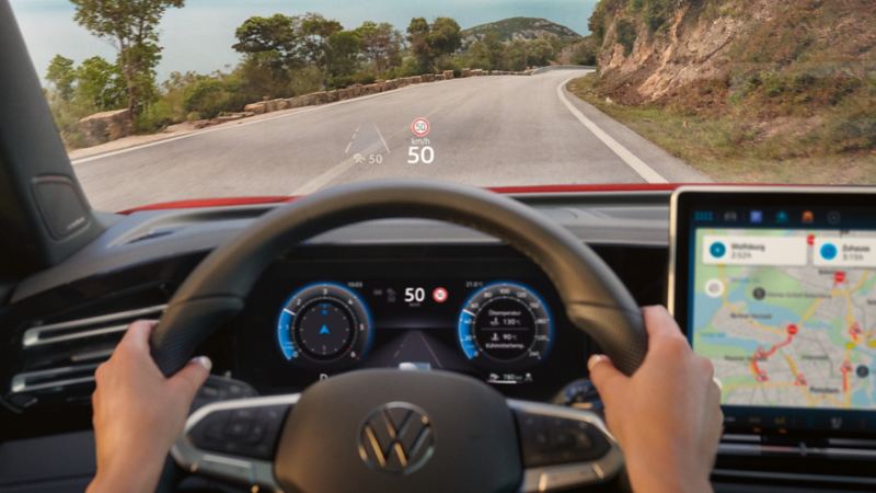 Detailed view of the steering wheel and head-up display in the VW Tiguan.
