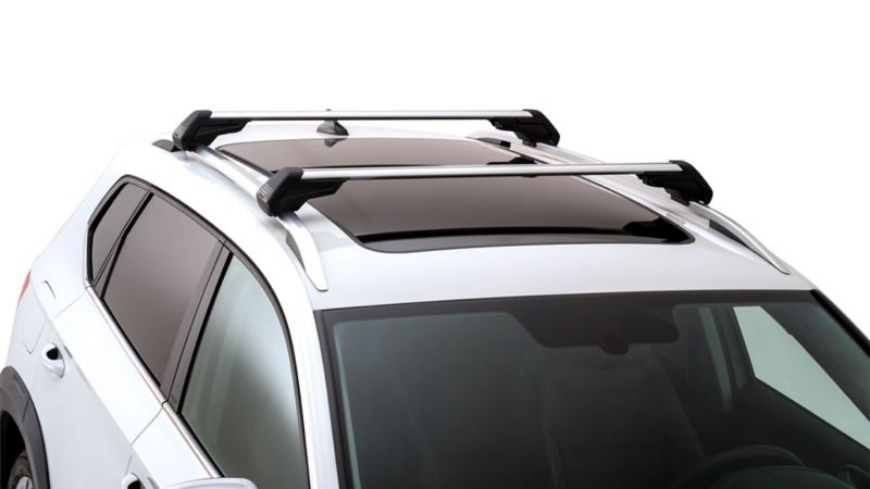 Accesorios Volkswagen para camioneta Taos. Barras portantes de aluminio con elementos de plástico en color negro. 