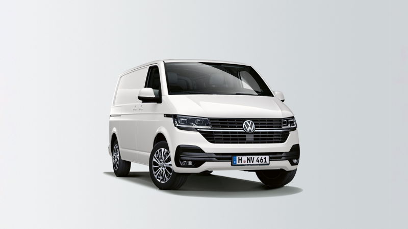 En vit Volkswagen Transporter Skåp