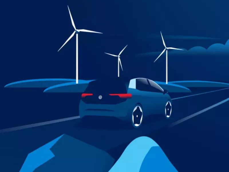 A blue Volkswagen electric car illustration driving on a road at night with three white wind turbines in the background.