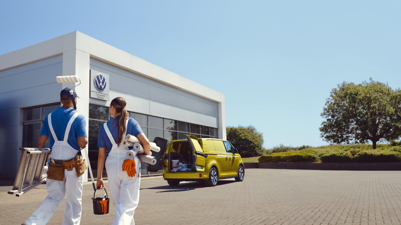 Car dealer and customer at Van Centre desk