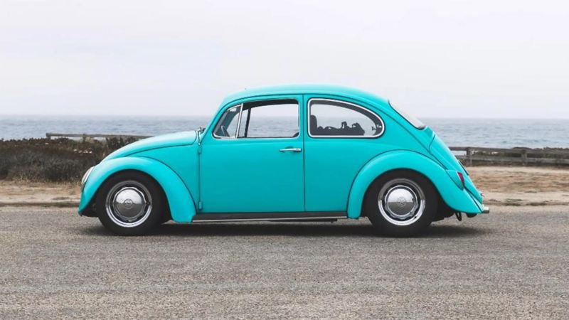 Classic turquoise VW beetle.