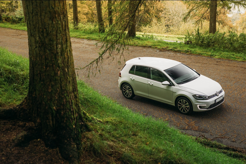VW Golf parked on a country lane