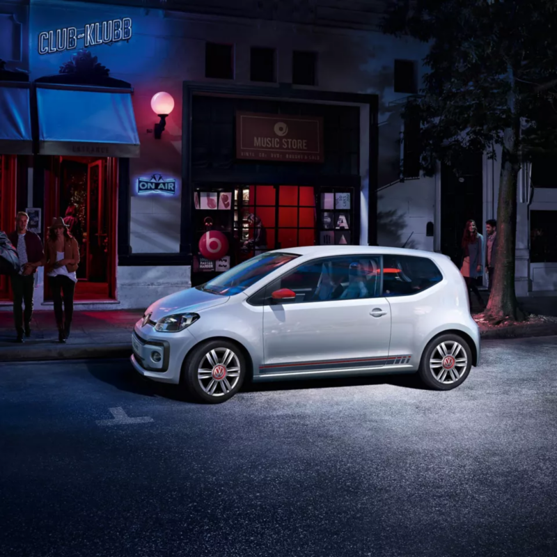 VW up! parked on a street and night
