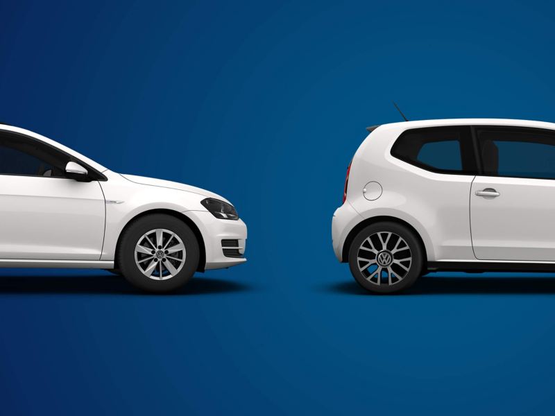 Approved Used Volkswagen cars lined up UP and Passat, white colour on blue background