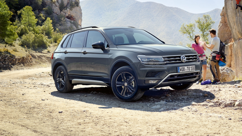 3/4 view of a grey VW Tiguan on an off-beaten road