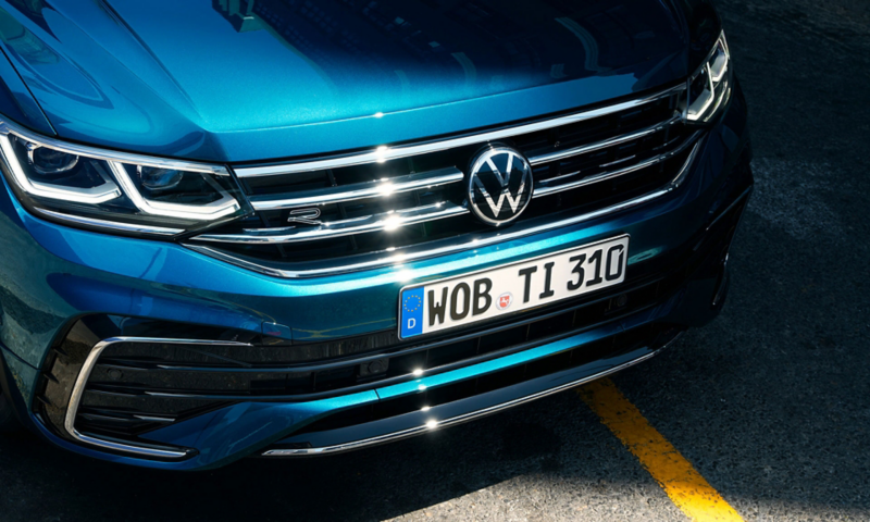 A close up of the New Tiguan grille, showcasing IQ.Light LED matrix headlights.