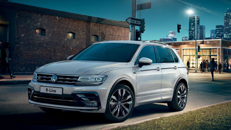 Silver Volkswagen Tiguan R-Line, parked in a city back-street.