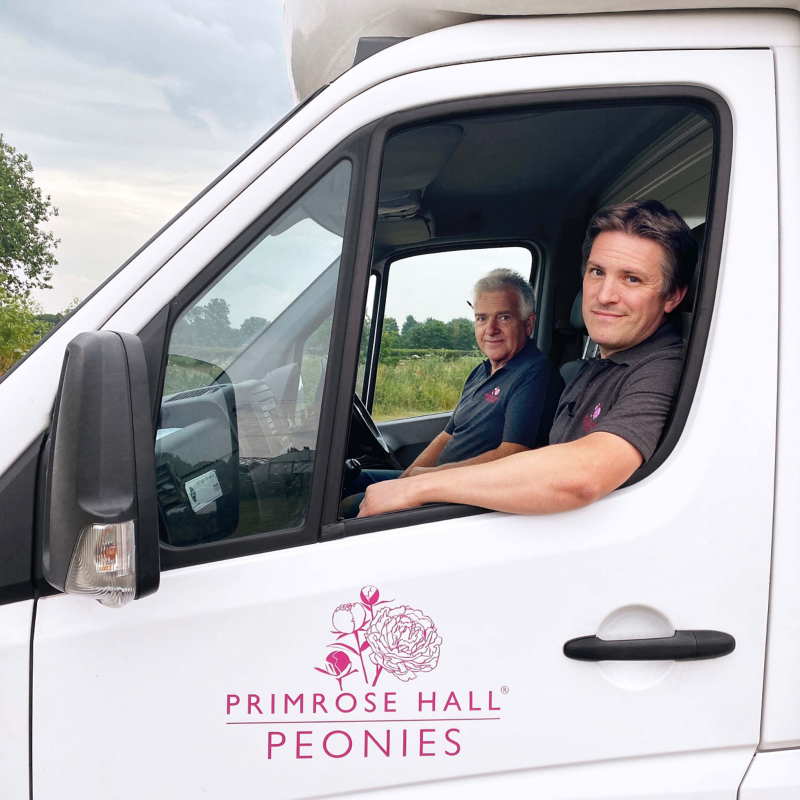 Primrose Hall inside the cab of their Volkswagen Crafter conversion