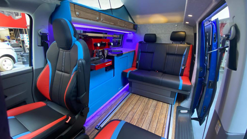 Photo showing the interior of a converted VW Transporter.