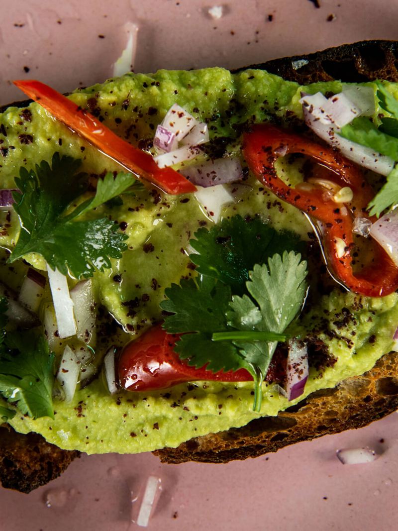Avocado toast with a garnish on top