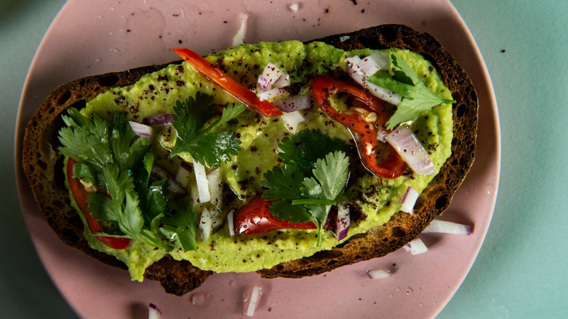 Avocado toast with a garnish on top