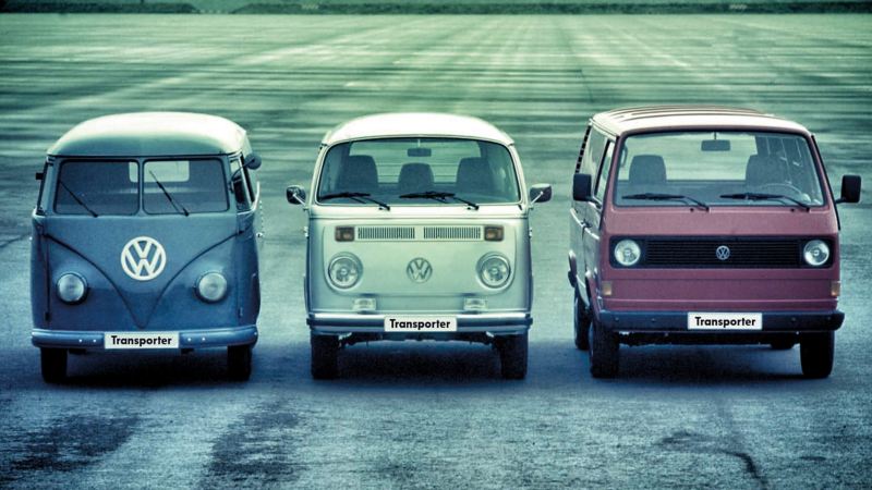 Three Tranporter vans from the 1970's lined up