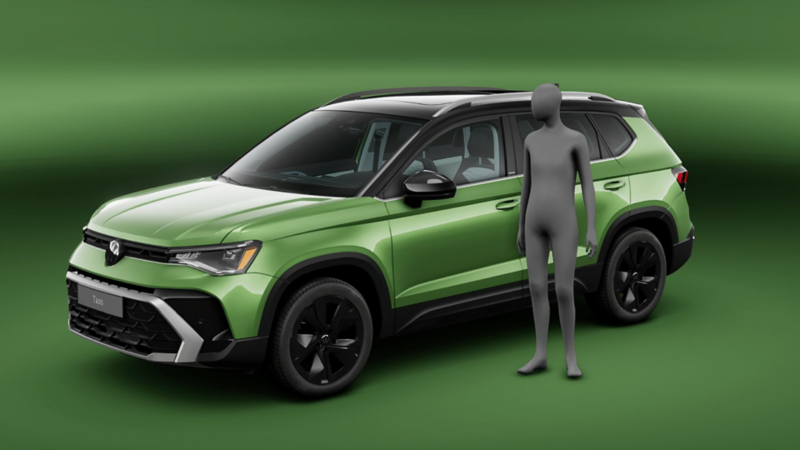 Volkswagen Taos. Vista frontal de SUV de color verde junto a silueta humana para mostrar escala.