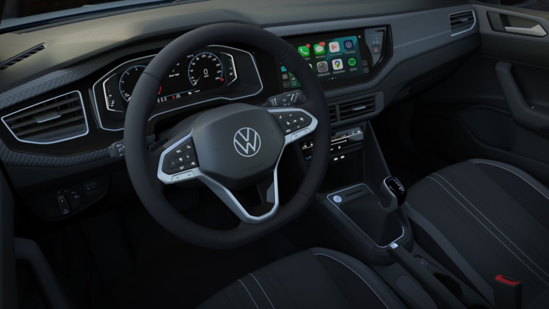 Volante multifunciones y pantallas en el interior de VW Nivus 2026. 