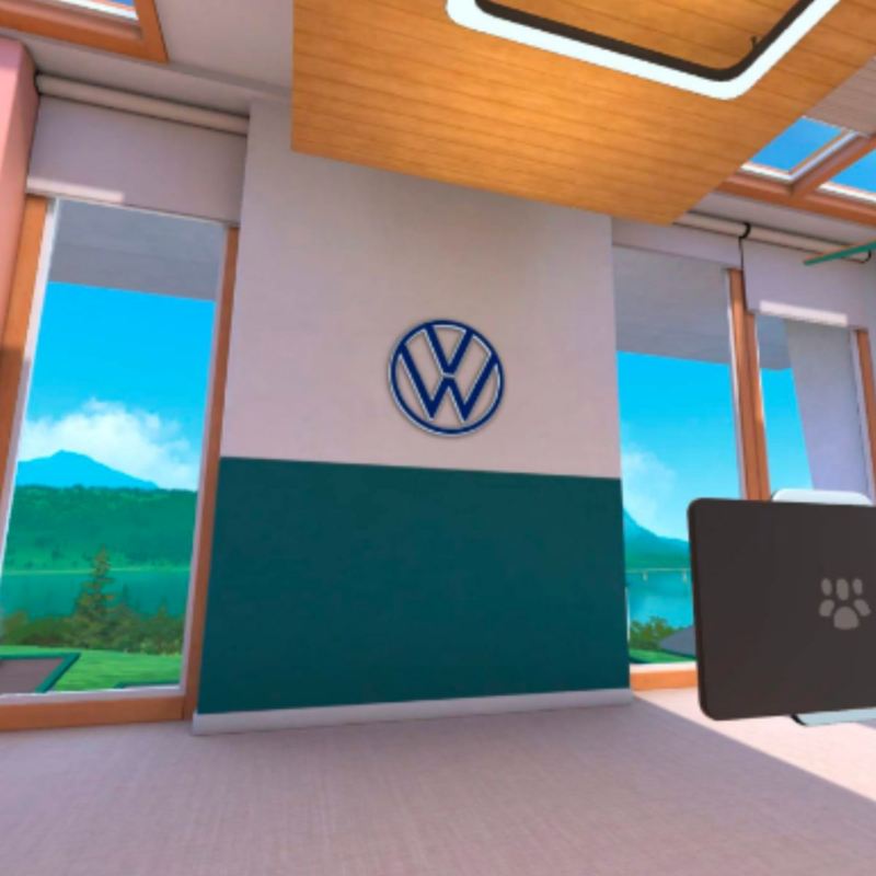 Logo de Volkswagen en pared de concesionaria digital en Metaverso. 