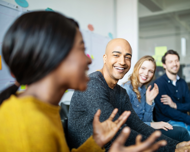 A group of young people in a discussion