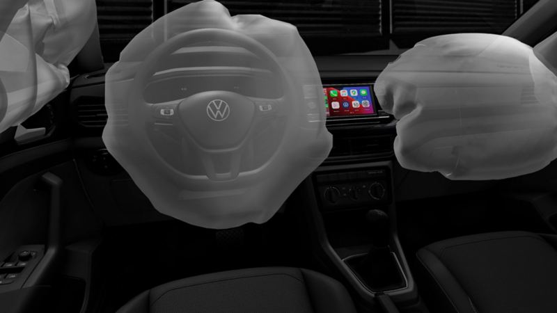 Interior de Volkswagen T Cross 2024, con bolsas de aire en piloto, copiloto y laterales.