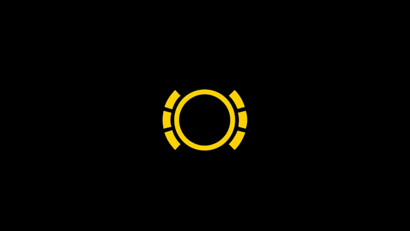 Indicador amarillo de desgaste de pastillas de freno en VW. Un círculo con líneas discontinuas a los lados.