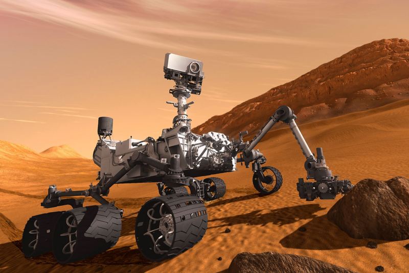 Zu sehen sind ein Roboter und eine Drohne auf dem Mars.