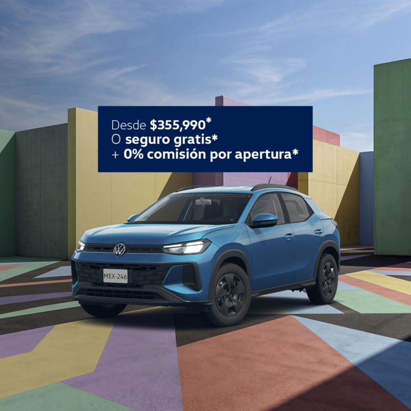 Volkswagen Tera color azul en jardín con árboles y pasto verde.