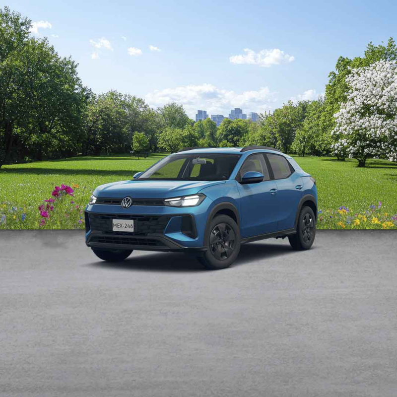 Volkswagen Tera color azul en jardín con árboles y pasto verde.