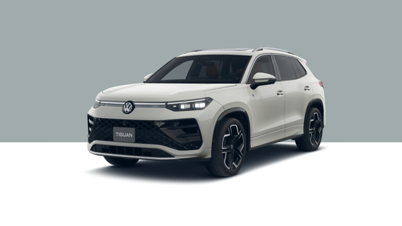 SUVW Tiguan en color exterior blanco con faros LED, parrilla negra y rines de diseño exclusivo.