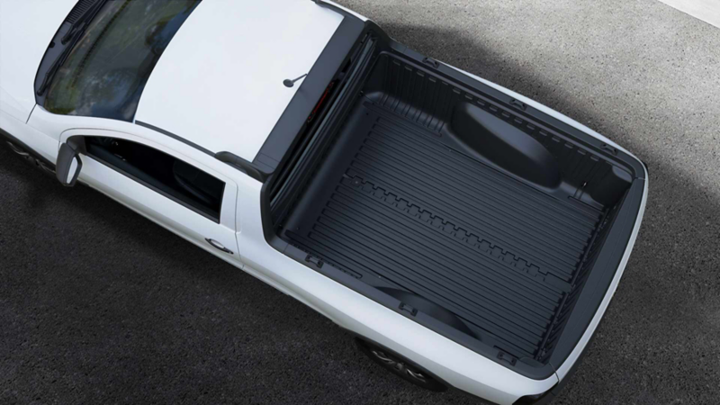 Pick up Saveiro 2026. Bedliner o área de carga con recubierta plástica antiderrapante. 