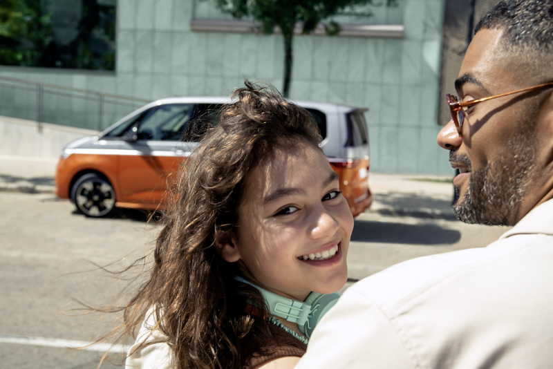Multivan PHEV with smiling girl