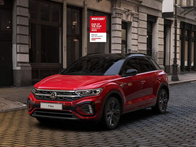 Red T-Roc parked on cobbled city street