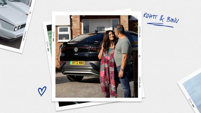 A couple smiling at one another in front of their ID.5 as it charges in the driveway of their home