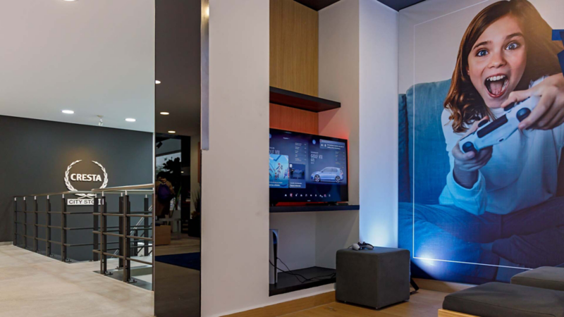 Imagen de Volkswagen City Store Cresta, con área de videojuegos para los niños o adolescentes.